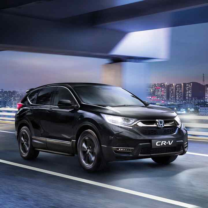 Tříčtvrtinový pohled zepředu na model Honda CR-V Hybrid se sadou Style